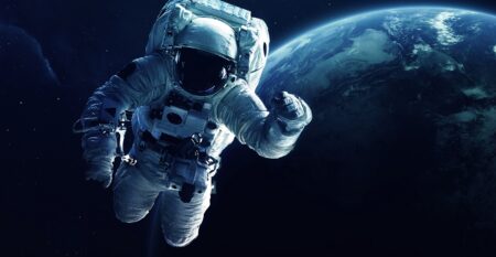 Astronaut In Front Of The Earth Planet Elements Of This Image F